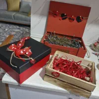 جعبه پاکت عروسک پوشال گیفت شمع و وسایل کادویی