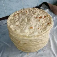 استخدام نانوا مسلط به تنور گلی سنتی در مسجدسلیمان