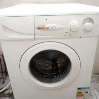 لباسشویی آبسال سالم فقط درب گیر کرده باز نمیشه