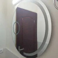 آینه گرد دستشویی یا دم دری
