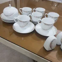 چهار دست فنجان و نعلبکی و قندان به همراه نمکدان