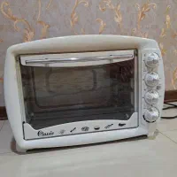 آون توستر با  جوجه گردان