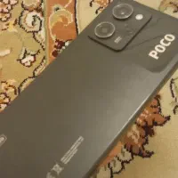 پوکو ایکس فایو پرو در حد آکبند