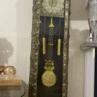 ساعت آینه و شمعدان