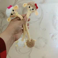عروسک گردن دراز بافتنی