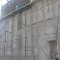 انجام کارهای سیمان کاری دیوار چینی شیب بندی
