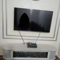 تلویزیون ال جی 49اینج ومیز تلویزیون شومینه