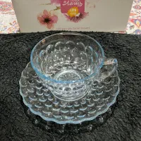 ۱ ظرف شیرینی۲ طبقه اکبند وتعدادی ظروف پذیرایی وچای