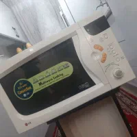 ماکروفر الجی اصل درحدنو مناسب جهیزیه 34لیتری