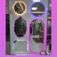 تولید و پخش آینه بکلایت دفرمه و انواع شیشه