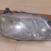 چراغ جلو مزدا ۳۲۳ اصل فابریک ژاپن
