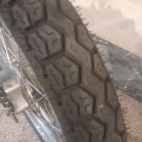 دوچرخ و لاستیک و کمک۱۲۵