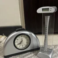 ساعت رو‌میزی چراغدار و خودکار اهن ربایی