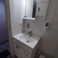 روشویی به همراه آینه و کابینت