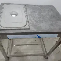 هواکش و ترولی و تابلو و نئون، ظرف سس