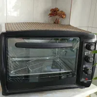 آون توستر ۶۰ لیتری همراه سینی و جوجه گردان