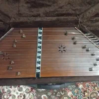 سنتور با سه تا چوب