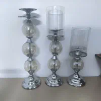 سه تا شمعدان سالم فقط شیشه یکی شکسته ک‌شوش داره