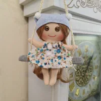 عروسک دختر تاب سوار