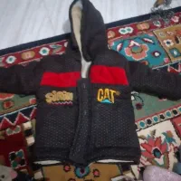 لباس زمستانی و کلاه بچگانه