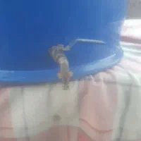 بشکه۲۲۰لیتری پلاستیکی باشیربرنجی سالم