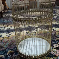 قفس گرد طلایی