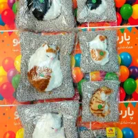 عروسک گربه  موزیکال خوابیده روی بالشت