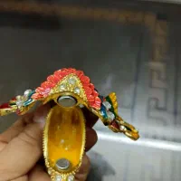 طاووس جنس برنز یا برنج نو نو