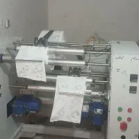 دستگاه رول پیچ سفره یک بار مصرف دو روله ۳ کاره