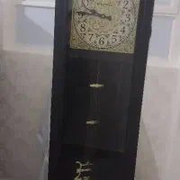 ساعت ایستاده سنتی و میز تلویزیون مشکی