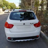کوییک RS مدل ۱۴۰۲ سفید سقف مشکی کم کارکرد