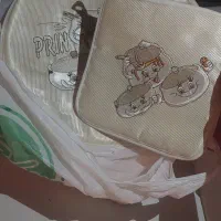 رو تختی . پارچ لیوان .تعدادی شلوار پارچه ای