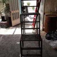 پله چرخ دار و درب فرلزی سنگین