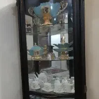 ساعت و ویترین و میز و آینه