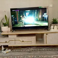 یه عدد میز تلویزیون یه بوفه نونو