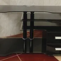 زیر تلویزیونی شیشه ای در حد نو