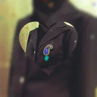 گل سینه جواهر دوزی وجواهردوزی روی مانتوولباس