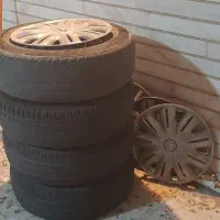 ۴عدد رینگ ولاستیک و قالپاق چهارپیچ شماره ۱۵   دنا