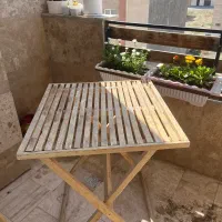 میزبالکن و داخل باغ