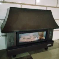 بخاری گازی نیک کالا طرح شومینه