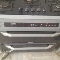 یک عدد گاز ۵ شعله صفحه شیشه سالم