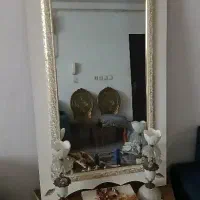 آیینه و کنسول و شمعدان