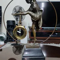 ساعت و حلقه مجسمه هونگ برنزی برنز