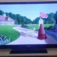 تلویزون ۴۲ اینچ به همراه میز تلویزون درحد نو سونی