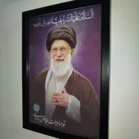 قاب عکس رهبر انقلاب و رهبر شهید
