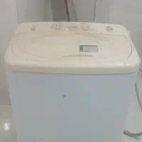ماشین لباسشویی ۹کیلو،زردقناری