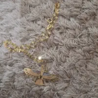 مقداری طلا ۱۰۰ بالای تابلو
