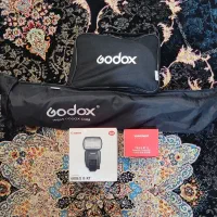 فلش کانن 600EX II-RT و تریگر یانگنیو YN-E3-RT II