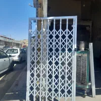 نصب فوری. درب کشوئی آکاردئونی محافظوحفاظ سنگین.شیک