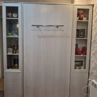 تخت تاشو همراه ویترین.و کمد
